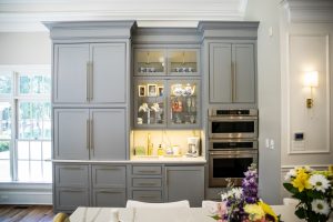 Open Concept Elegant and Spacious Kitchen with large gray custom Cabinets